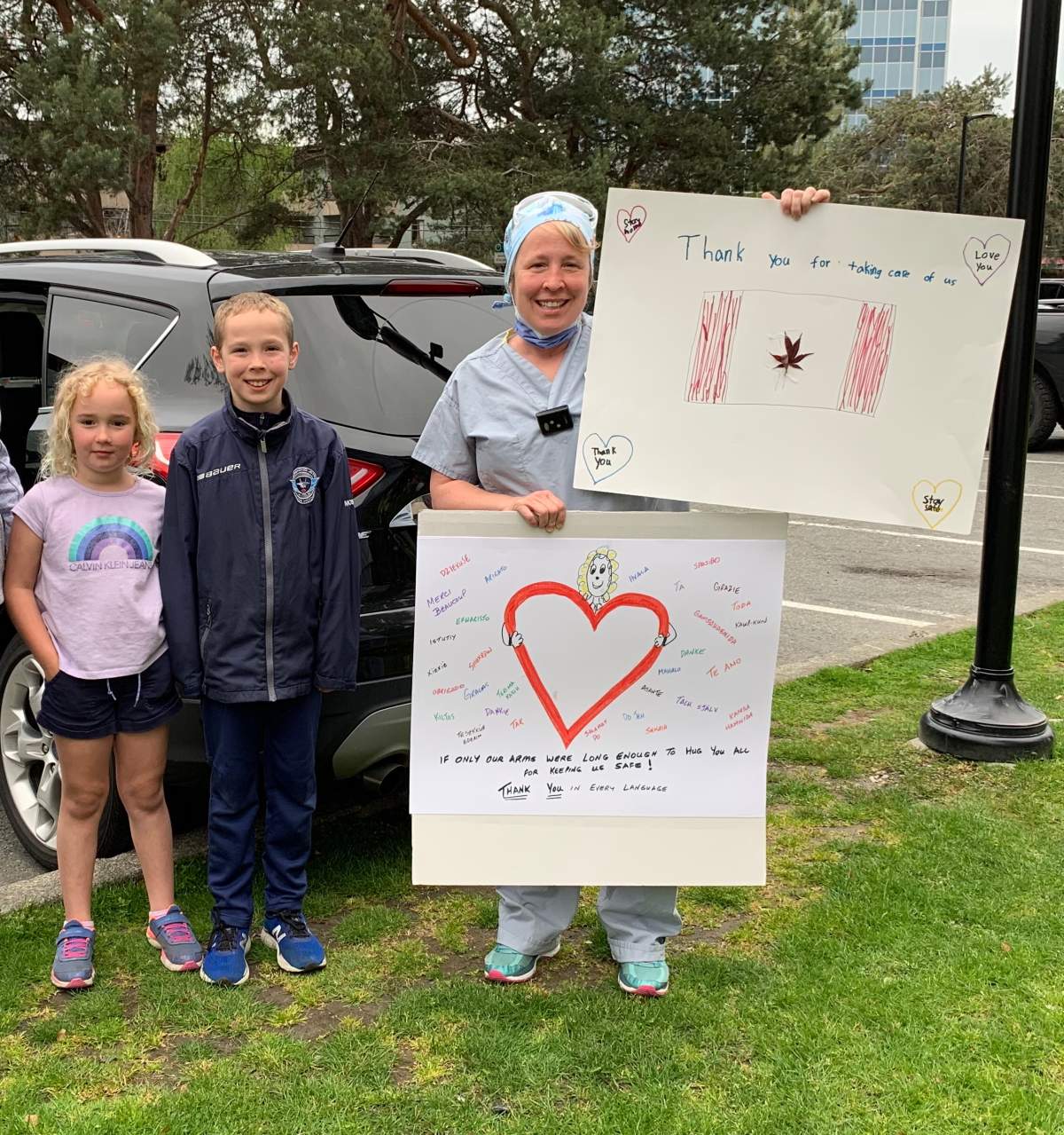 Tracy Moser and her two children Kate and Jake during a local 7 p.m. front-line worker salute. Photo provided by Tracy Moser. 