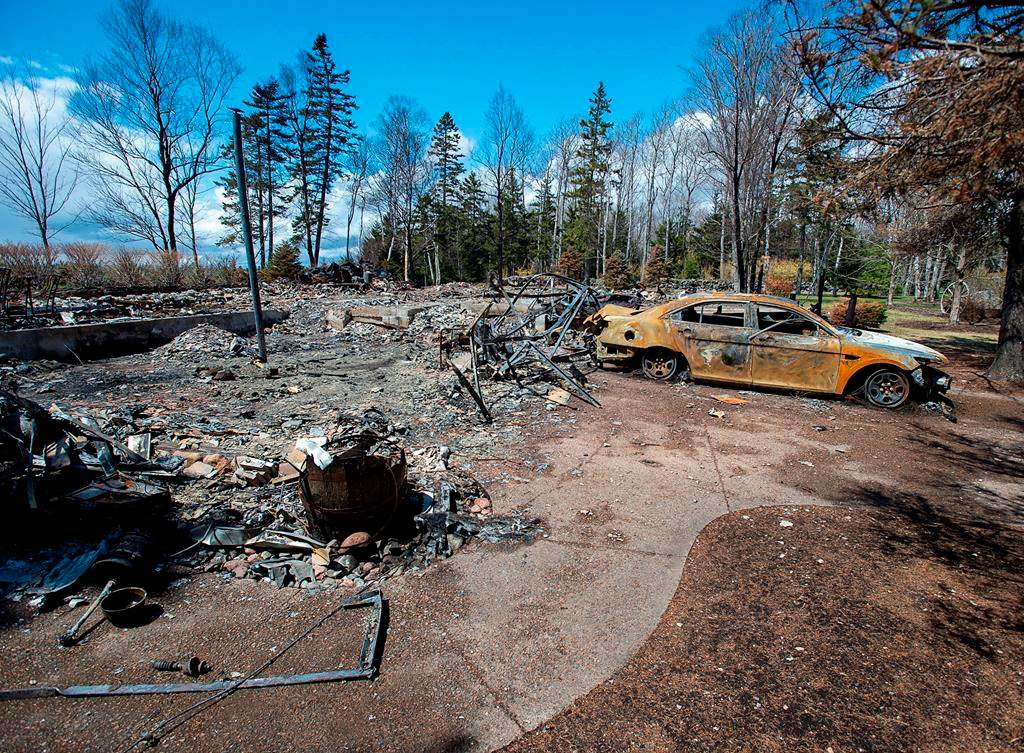 A fire-destroyed property registered to Gabriel Wortman at 200 Portapique Beach Road is seen in Portapique, N.S. on Friday, May 8, 2020. A former neighbour of the gunman behind last month’s mass shooting in Nova Scotia says she reported his domestic violence and cache of firearms to the RCMP years ago and ended up leaving the community herself due to fears of his violence.THE CANADIAN PRESS/Andrew Vaughan
