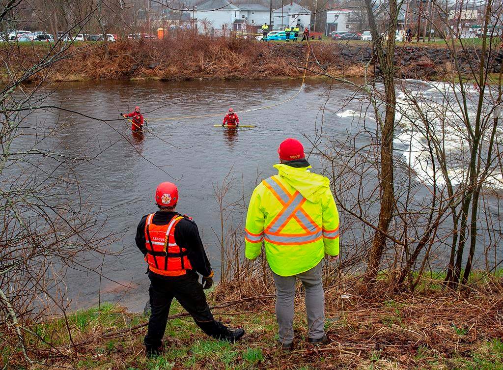 Rescue crews search for a missing three-year-old boy in the waters of the Salmon River in Truro, N.S., on Thursday, May 7, 2020.