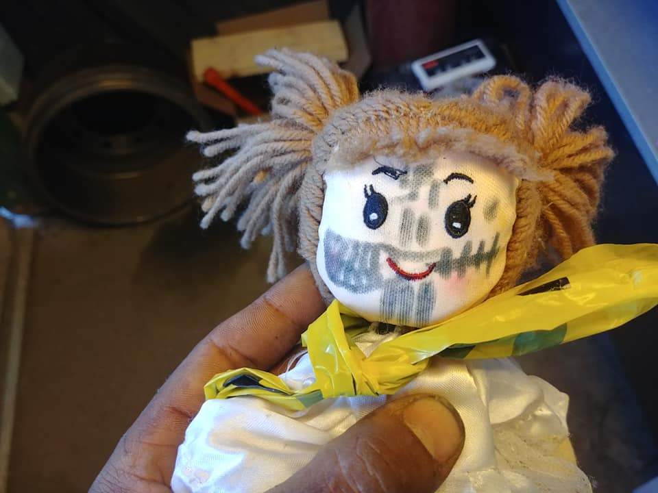 Brown says he arrived at work to find this doll in his mailbox.