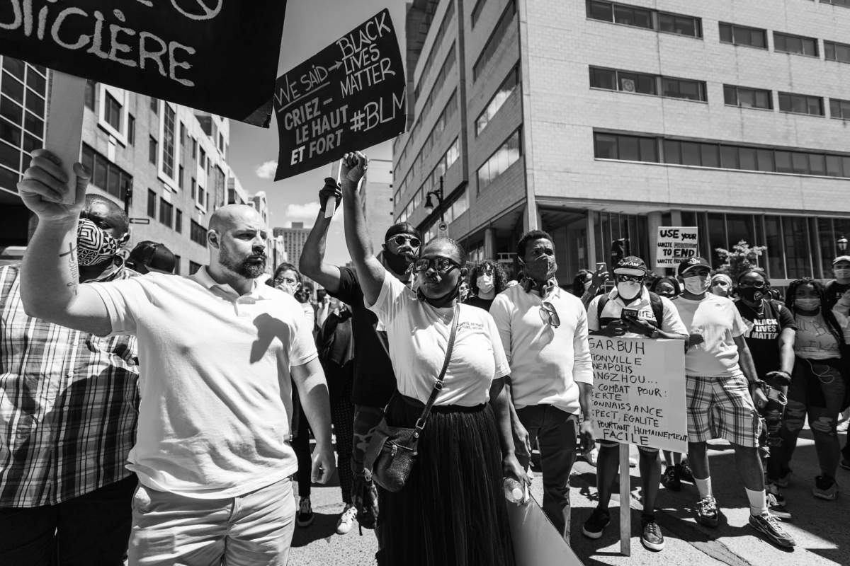 Marcelin, member of the Black Coalition New Generation marching with protestors on Sunday June 7, 2020.