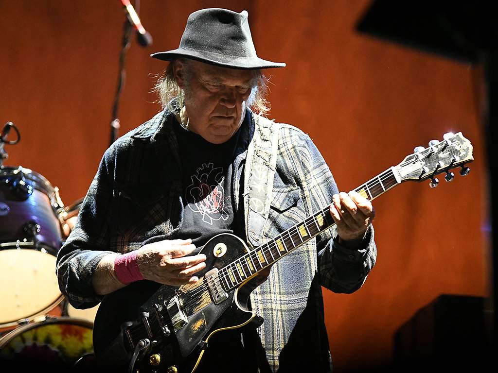 Neil Young performs at 'GoldenVoice Presents: Arroyo Seco Weekend' at the Rose Bowl in Pasadena, Calif. on June 23, 2018.
