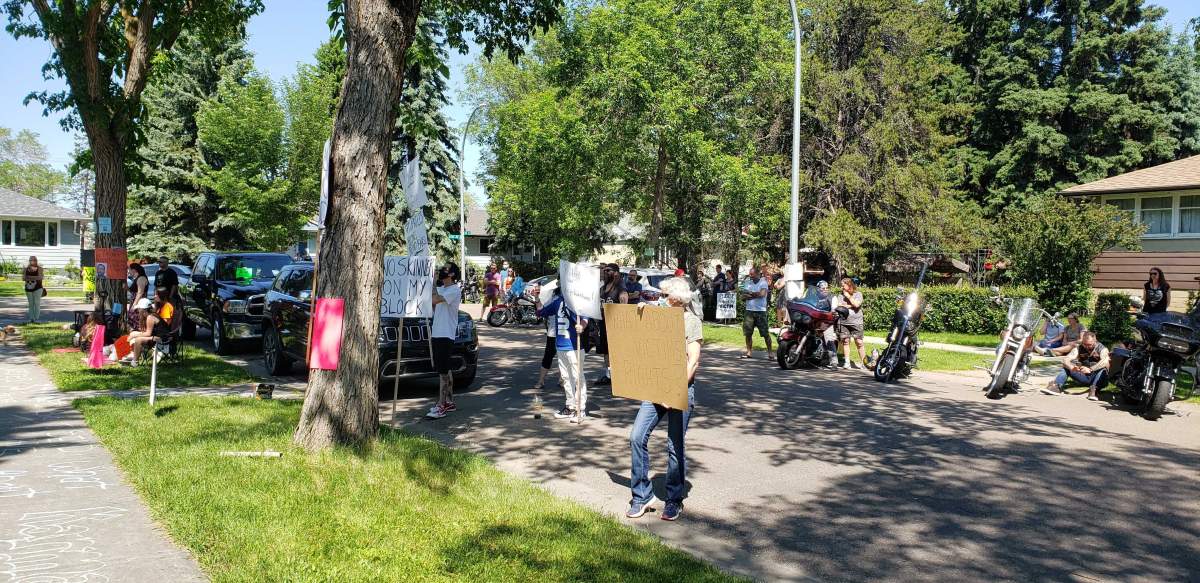 Protesters in Edmonton's McQueen neighbourhood on Saturday, June 20, 2020.