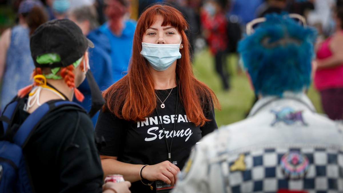 Brittany Bovey, centre, 23, attends the Black Lives Matter protest in Innisfail, Alta., Saturday, June 13, 2020, amid the COVID-19 pandemic.