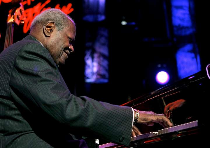 In this July 2005 file photo, Canadian jazz legend Oscar Peterson performs on the Stravinski hall stage during the 39th Montreux Jazz Festival in Montreux, Switzerland.