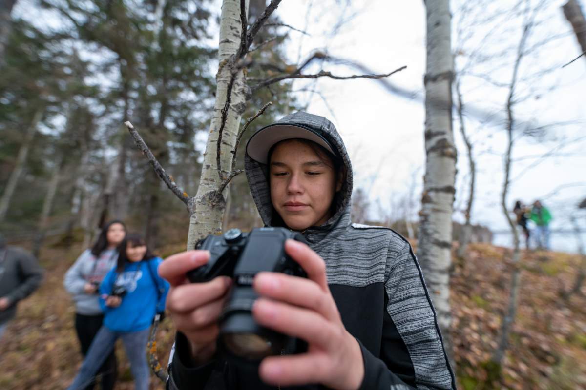 Kids Help Phone is supporting Indigenous communities such as Pinehouse, Sask., where the charity has partnered with a local youth photography club. Pinehouse Photography Club