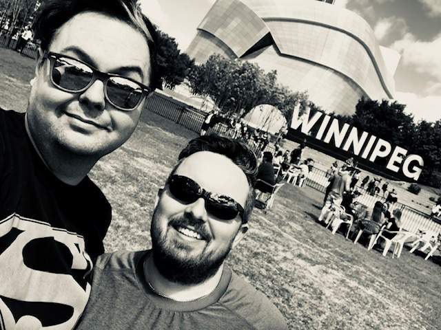 Michael Laducer (left) and his partner Jeremy Ernst are separated by the Canadian-U.S. border.