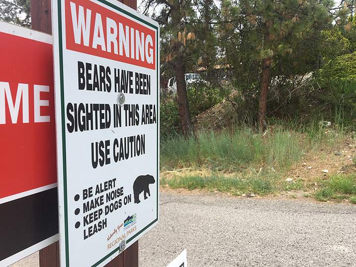 A sign from the Regional District of the Central Okanagan warning residents of possible bears in the area.