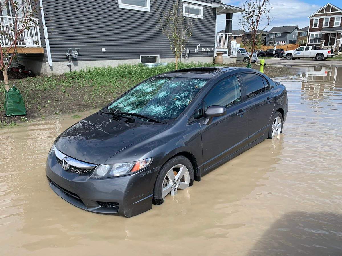Calgary begins cleanup after ‘devastating’ storm causes major damage, flooding - image