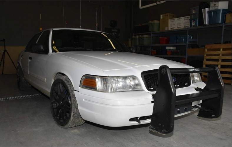 Calgary police have seized two vehicles in relation to a homicide investigation.