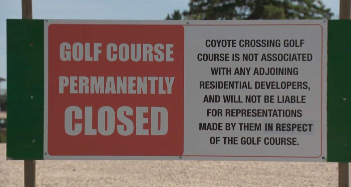Signs saying a cemetery was coming to a former Strathcona County gold course have upset those living by the course.