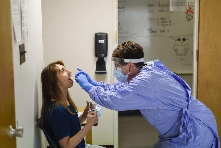 SHA employee Tracy Sanden gets tested for COVID-19.