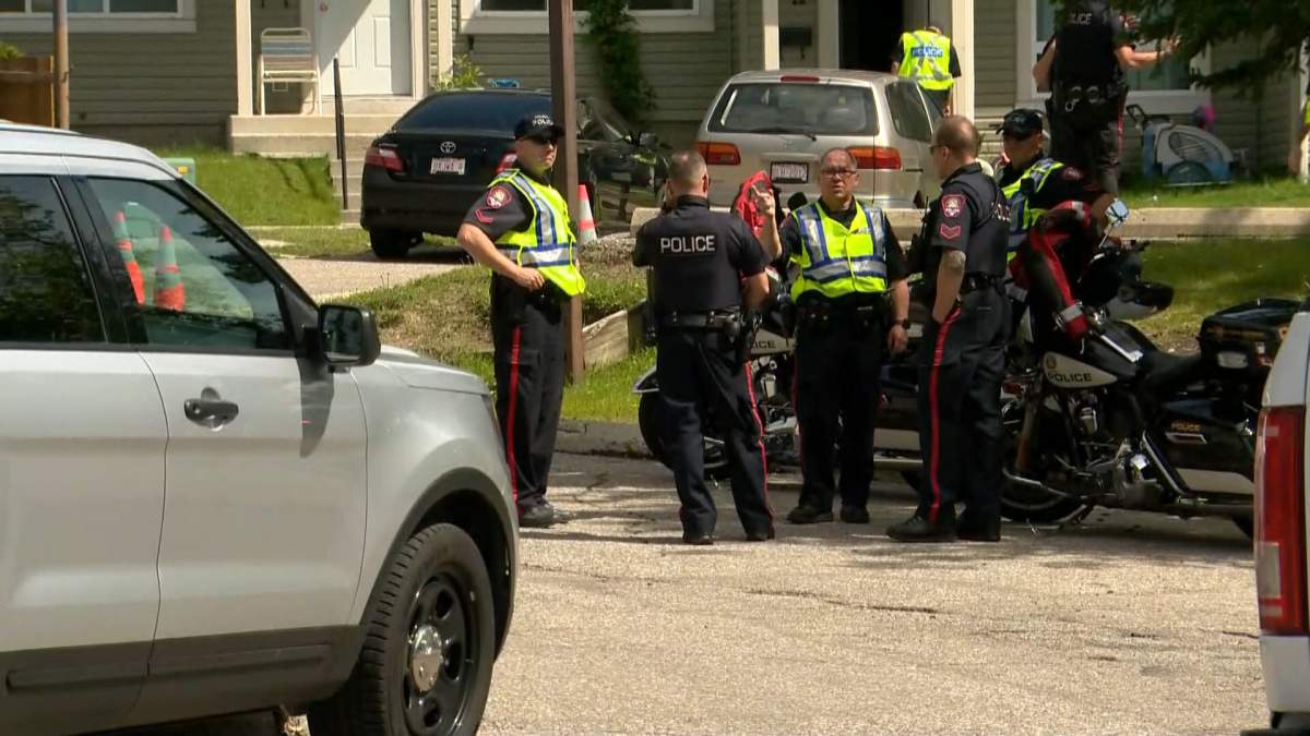 Calgary police on the scene of a hit-and-run collision that sent a toddler to hospital in Deer Run on Monday, June 22.