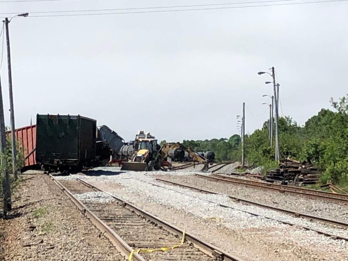 Crews work to clean up a train which derailed in Saint John, New Brunswick.
