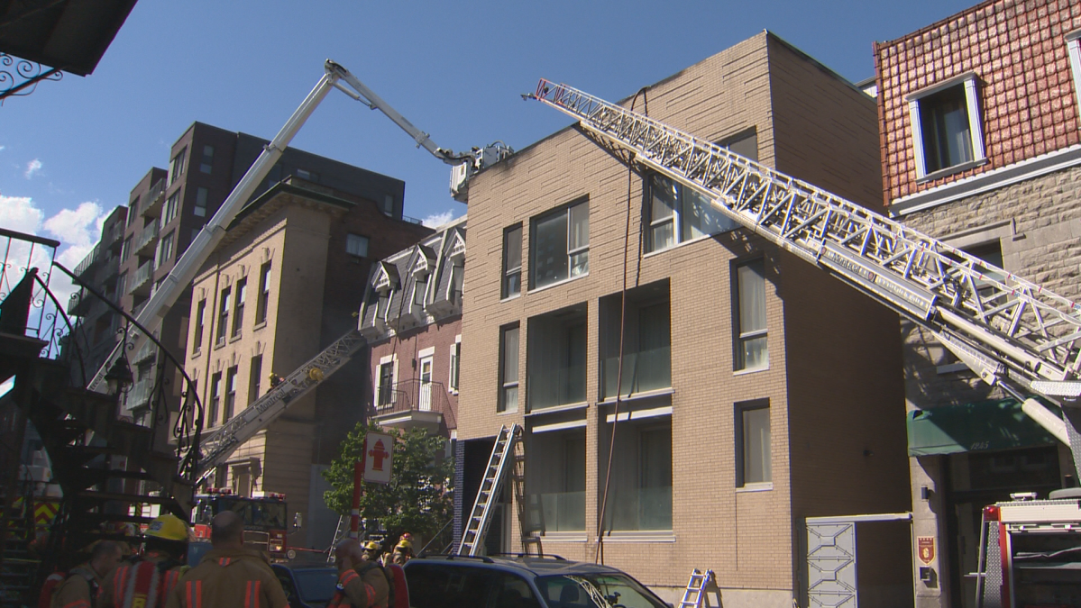 About 100 firefighters have managed to control a blaze in an apartment building in downtown Montreal. Thursday June 11, 2020.