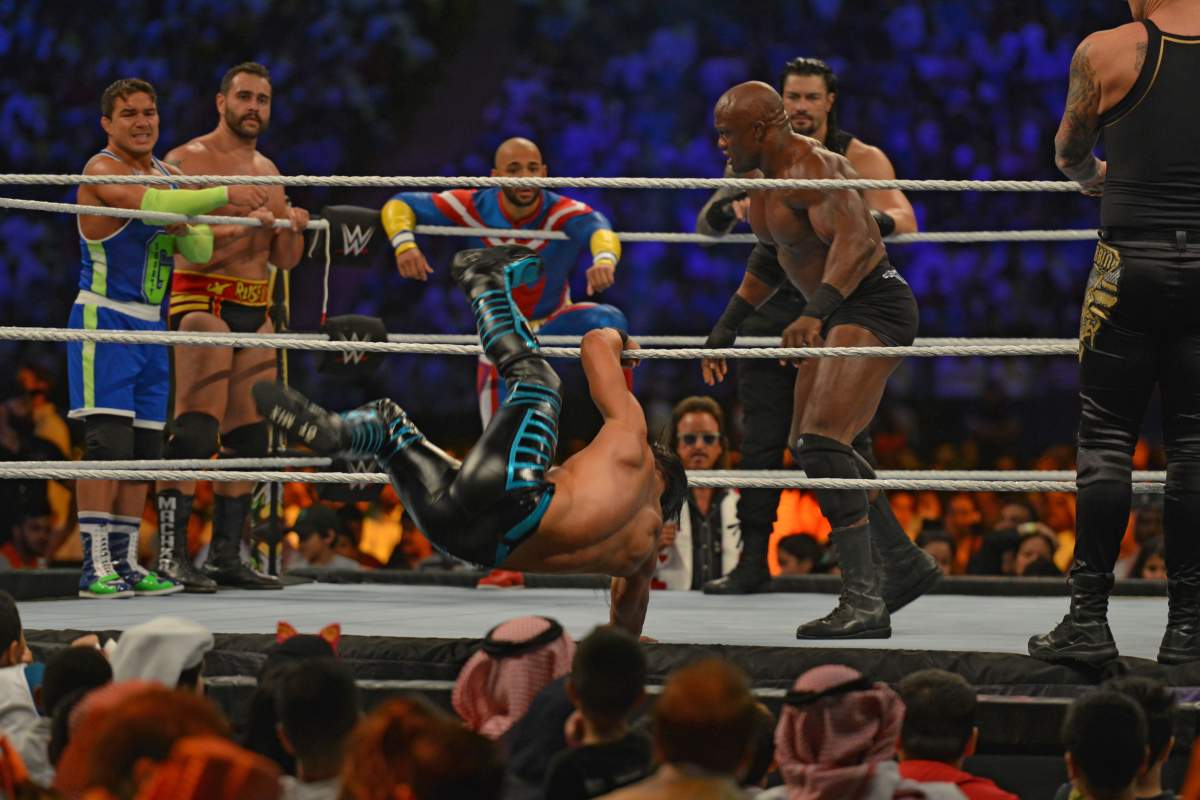 Bobby Lashley (second-right) fights against Ali during the World Wrestling Entertainment (WWE) Crown Jewel pay-per-view in Riyadh on Oct. 31, 2019.