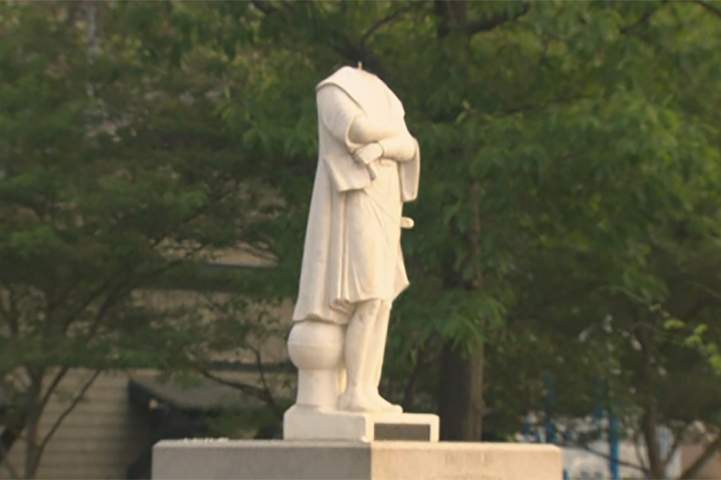 A headless Christopher Columbus statue is shown in Christopher Columbus Park in Boston, Mass., on June 10, 2020.