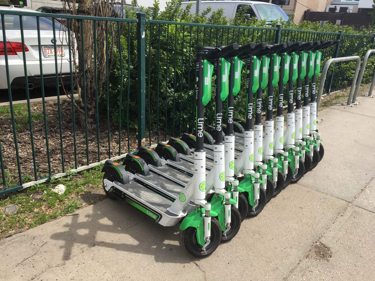 Lime electric scooters spotted on Whyte Avenue near 109 Street in Edmonton, Alta. on June 1, 2020.