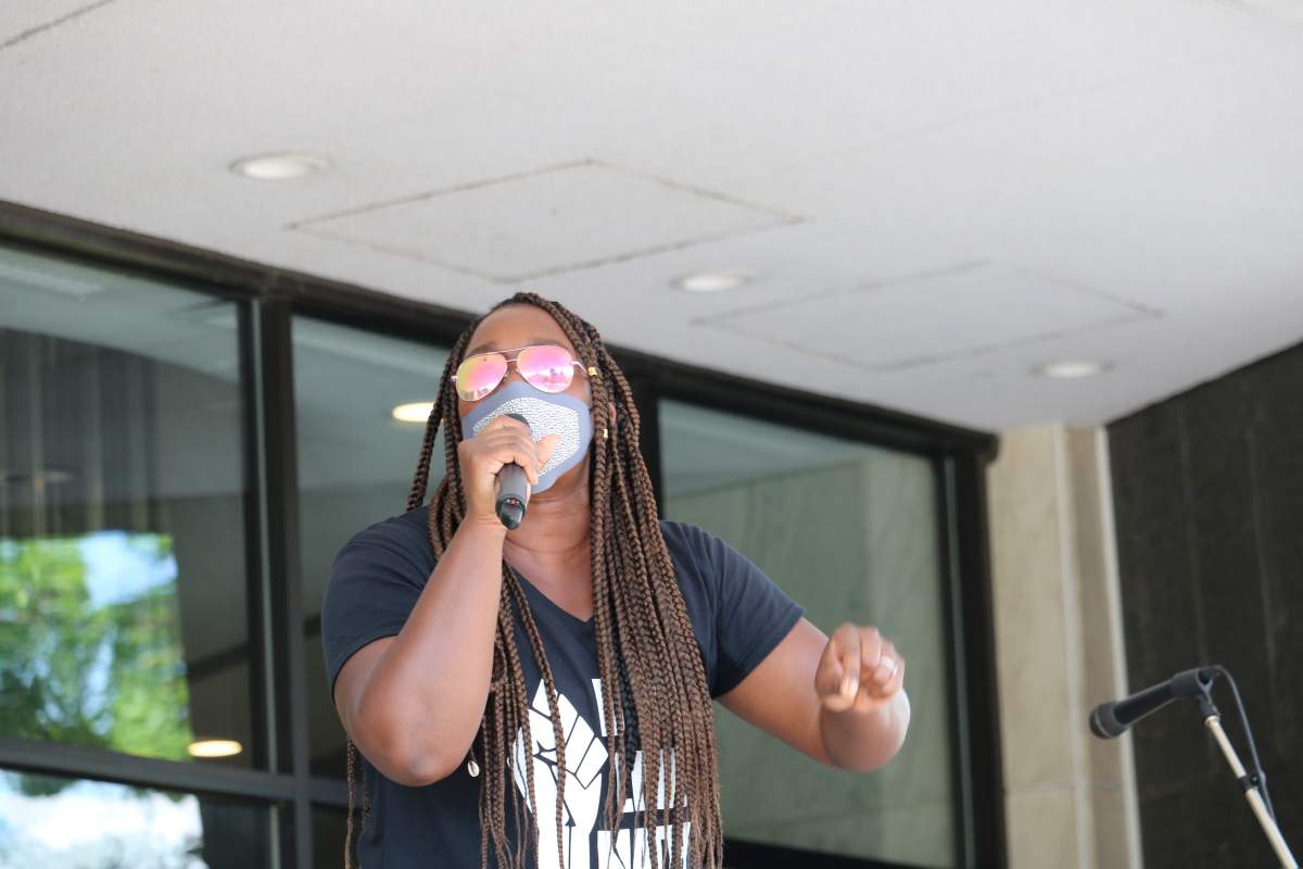 Black Lives Matter London spokesperson Alexandra Kane speaking to the crowd of people at the Black Lives Matter on the steps of London City Hall. June 20, 2020.