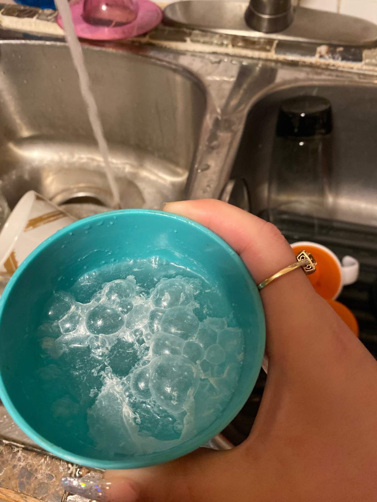 A Winnipeg woman says she doesn’t trust the water coming out of her taps after city crews tore up the road in front of her home.