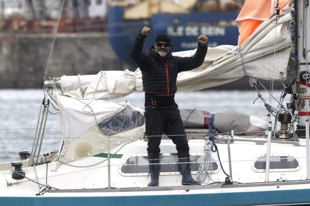 Juan Manuel Ballestero stands on his boat in Mar del Plata, Argentina, Thursday, June 18, 2020. 