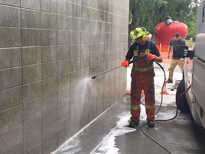 City of Kelowna crews began washing the graffiti away on Tuesday morning.