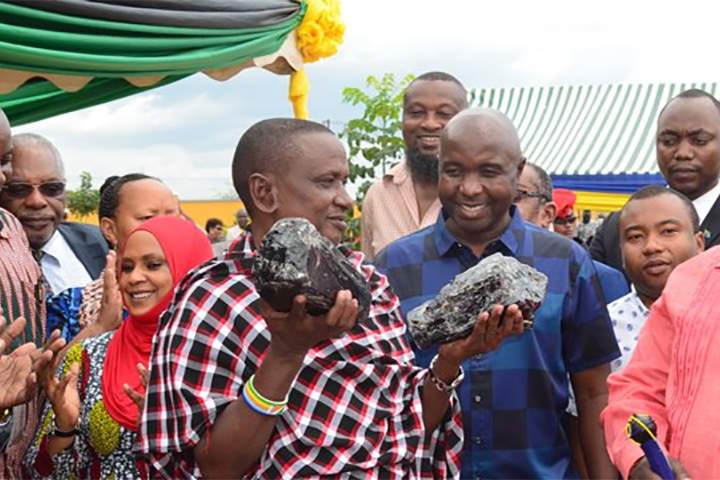 Saniniu Laizer, 52, shows off the gems found at his mine in Manyara, Tanzania, at an event on June 24, 2020.