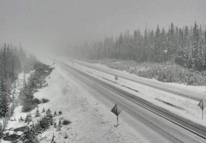 Highway Cam footage shows snow falling on Highway 97C near the Pennask Summit at 7:30 Sunday morning. 