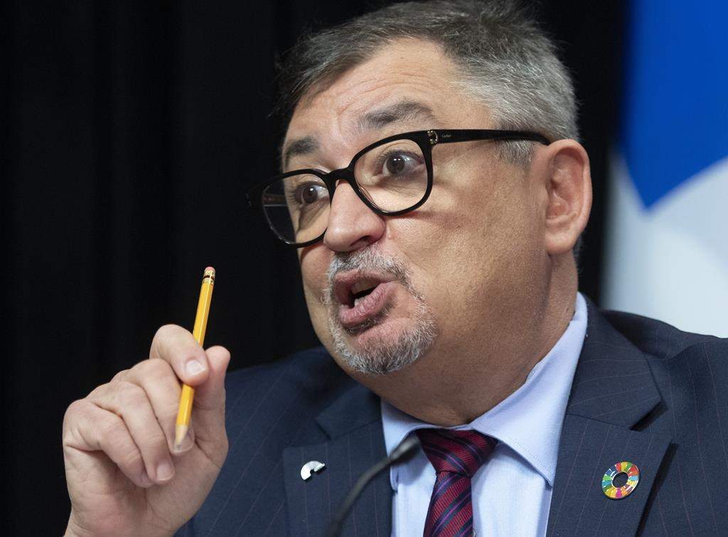 Horacio Arruda, Quebec director of National Public Health, responds to reporters during a news conference on the COVID-19 pandemic, Wednesday, June 17, 2020 at the legislature in Quebec City.