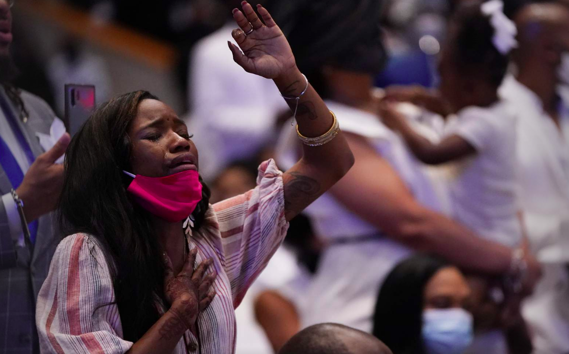 Family and guests attend the funeral service for George Floyd at The Fountain of Praise church Tuesday, June 9, 2020, in Houston.