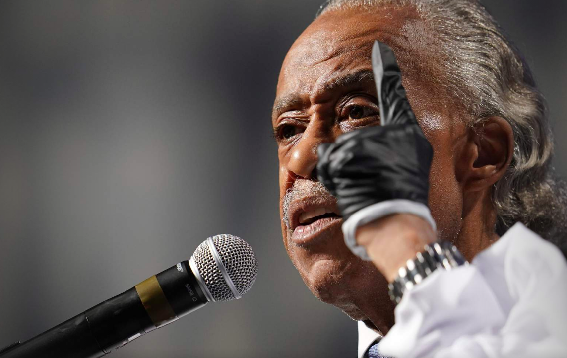 The Rev. Al Sharpton speaks during a funeral service for George Floyd at The Fountain of Praise church Tuesday, June 9, 2020, in Houston.