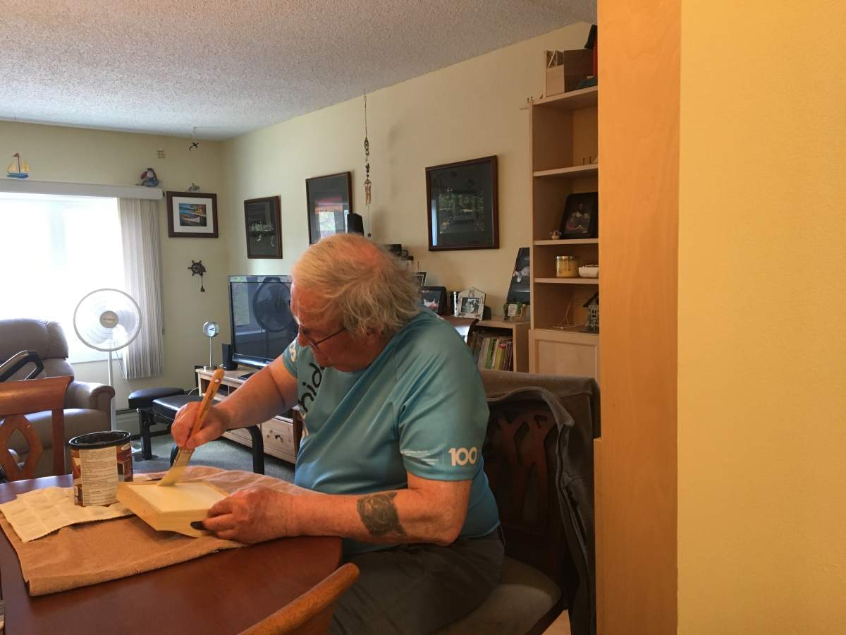 Henry Tonkin in his Calgary Heritage Housing apartment.