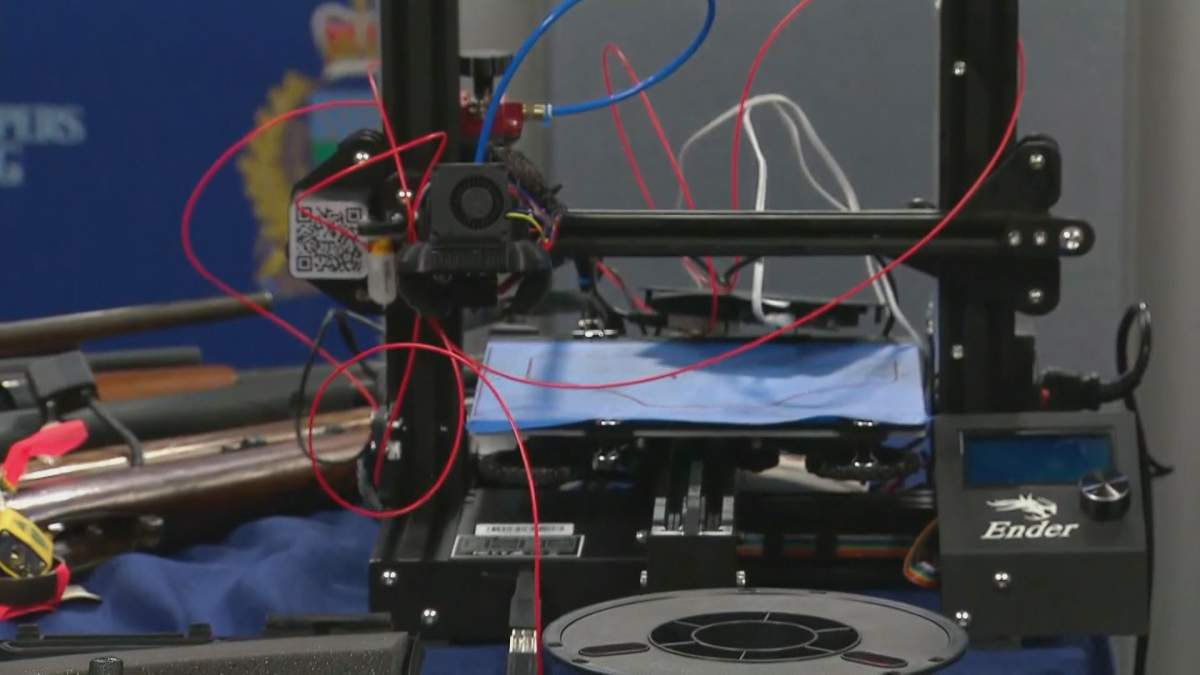 A seized 3D printer police say was used to print gun parts.