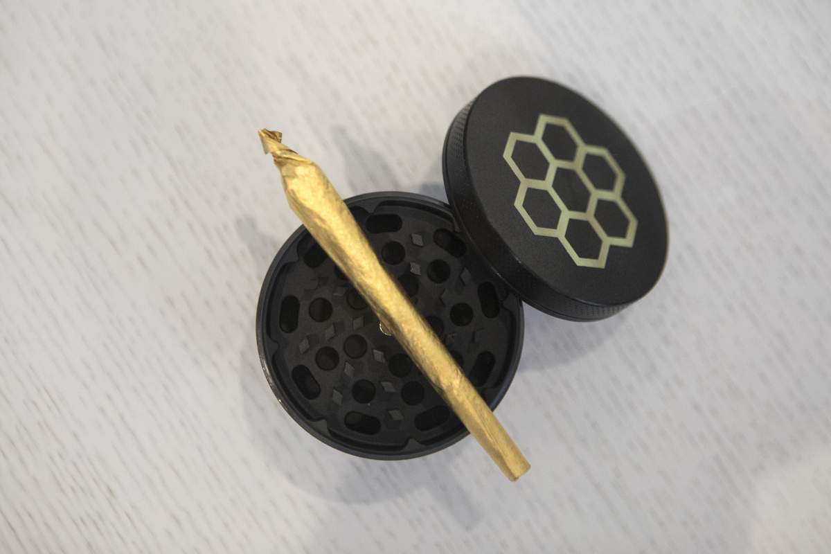 A pre-rolled cannabis product sits on display at The Hunny Pot store in Toronto.