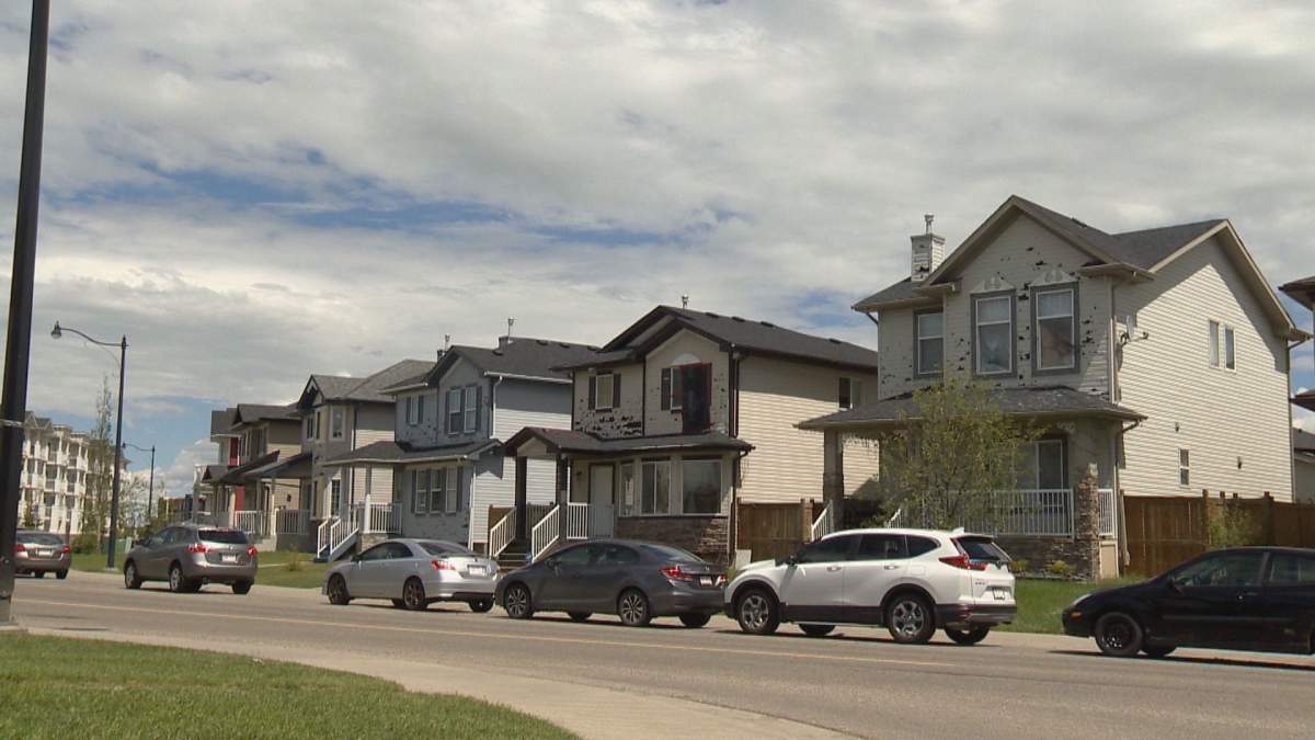 Siding is damaged at several Calgary homes following storm