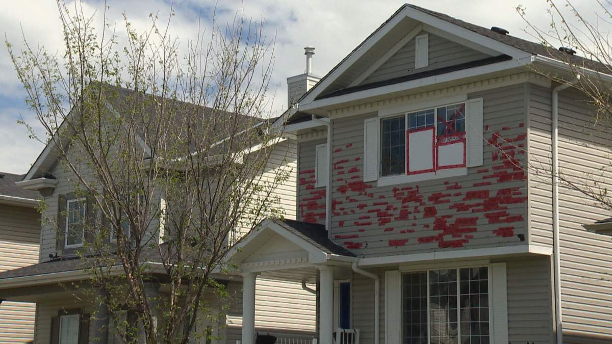 Siding is damaged at several Calgary homes following storm