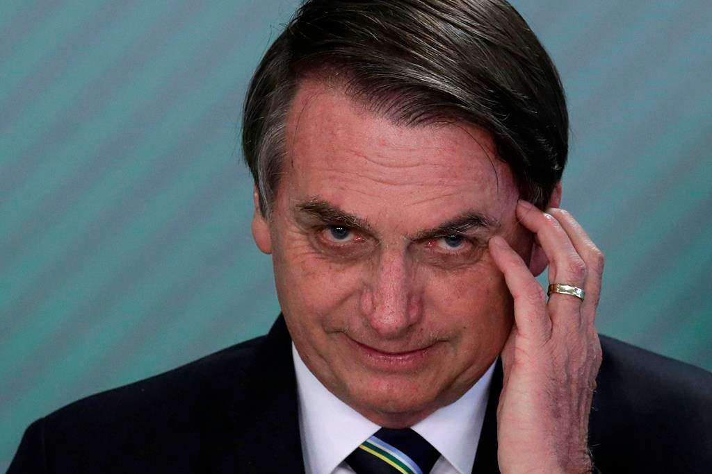 FILE - In this April 9, 2019 file photo, Brazil's President Jair Bolsonaro speaks during a swearing-in ceremony at the Planalto Presidential Palace, in Brasilia, Brazil. Bolsonaro’s latest education minister offered his resignation Tuesday, June 30, 2020, just days after his appointment, creating a new headache for the embattled leader as he struggles to start a new chapter at the ministry and shore up flagging support.