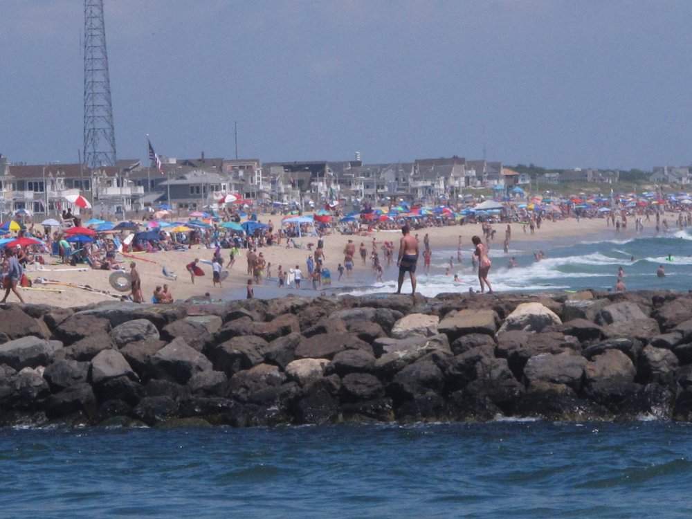 A large crowd fills the beach in Manasquan, N.J. on June 28, 2020.