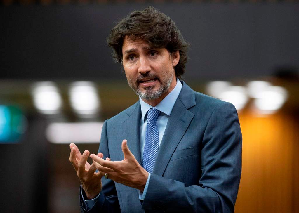 Prime Minister Justin Trudeau rises during a sitting of the Special Committee on the COVID-19 Pandemic in the House of Commons Wednesday July 22, 2020 in Ottawa. Members of the House of Commons finance committee will meet this afternoon to figure out the details of Trudeau's planned testimony.