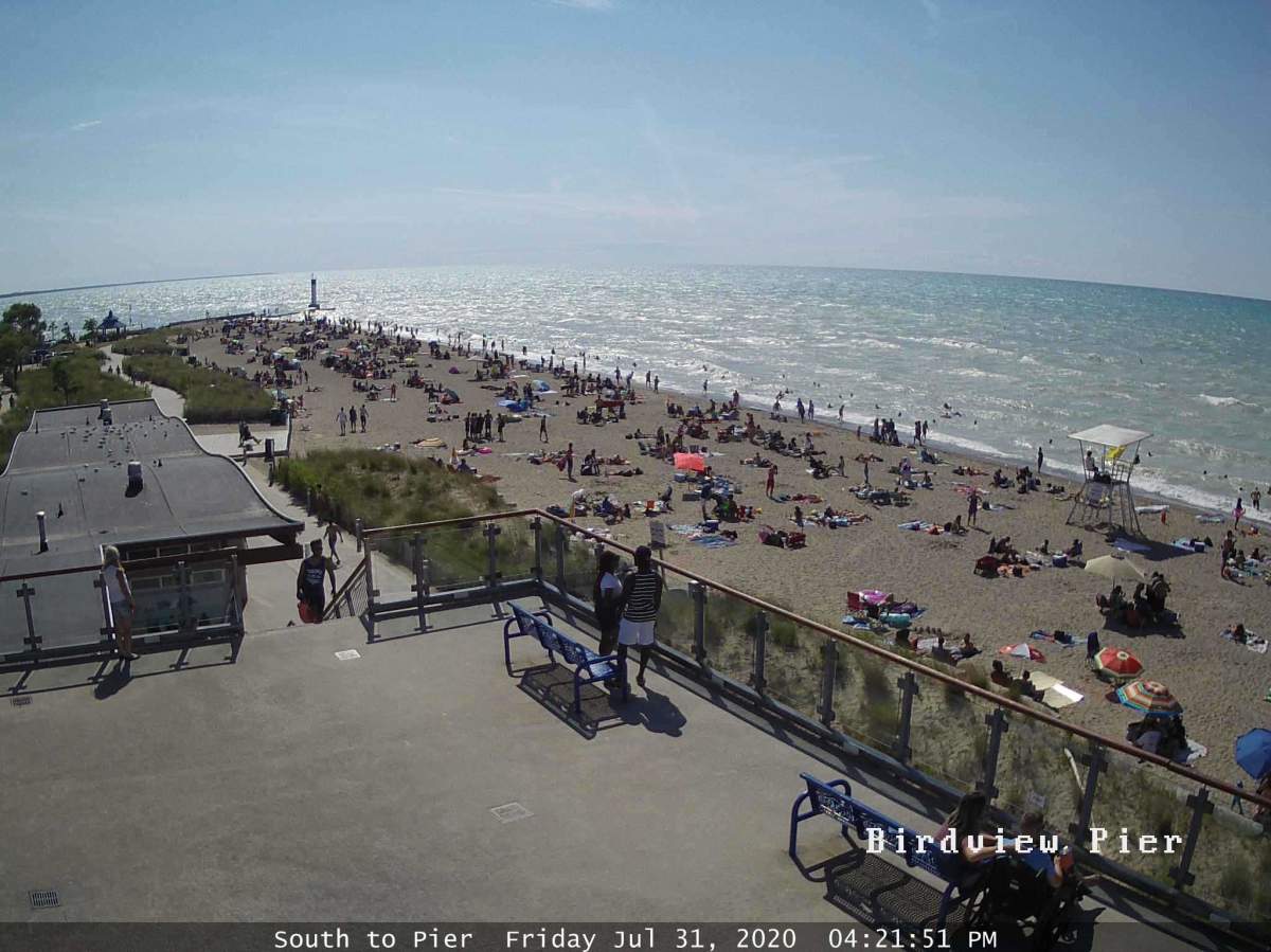 Crowds at Grand Bend’s main beach as seen from the municipality’s beach webcam on Friday, July 31, 2020.