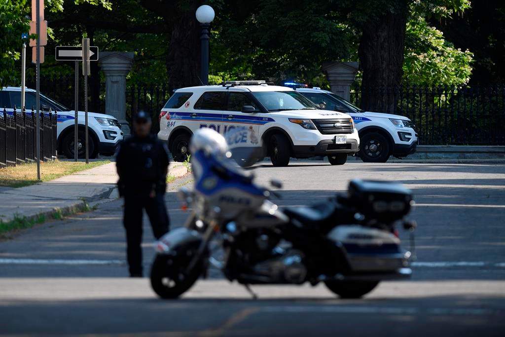 A police barricade is set up near Rideau Hall in Ottawa on Thursday, July 2, 2020. The RCMP say they have safely resolved an “incident” at Rideau Hall, where Gov. Gen. Julie Payette and Prime Minister Justin Trudeau live.