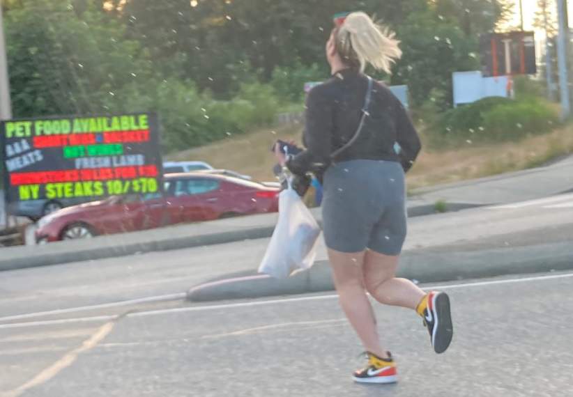 Do you recognize this woman? She is being asked to contact Coquitlam RCMP.