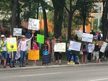 Anti-mask protesters are seen in Edmonton on July 19, 2020.