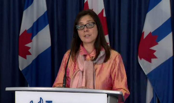 Dr. Eileen de Villa speaks at Toronto city hall on Thursday.