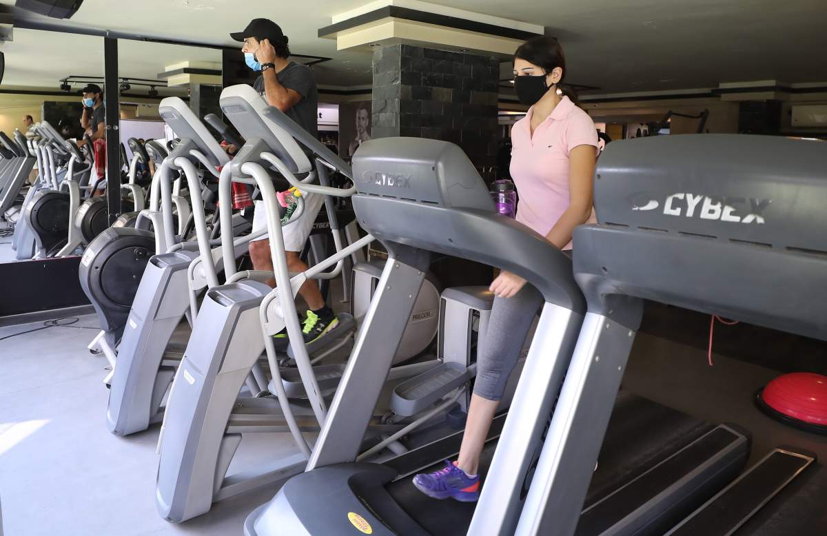 People training in a gym after reopening. 