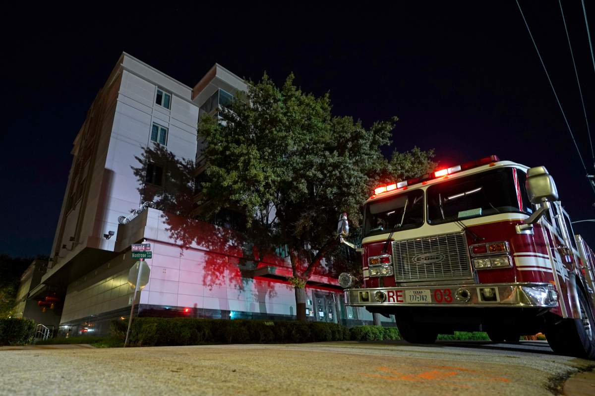 A firetruck is positioned outside the Chinese Consulate Wednesday, July 22, 2020, in Houston.