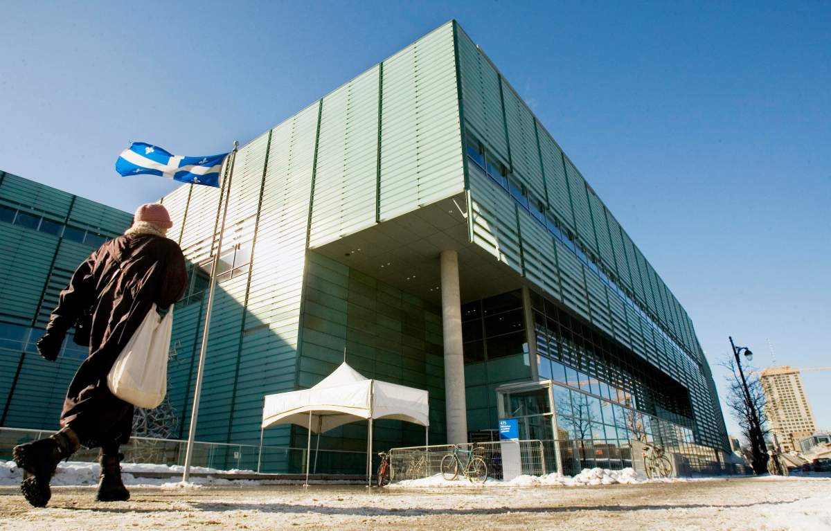 A man walks past the Grande Bibliothèque, Wednesday, Jan. 24, 2007 in Montreal.