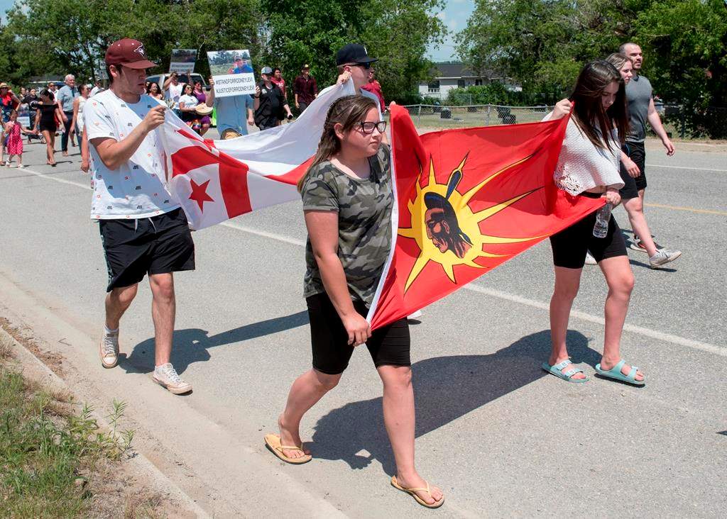 People walk to honour Rodney Levi in Red Bank, New Brunswick on Friday June 19, 2020.
