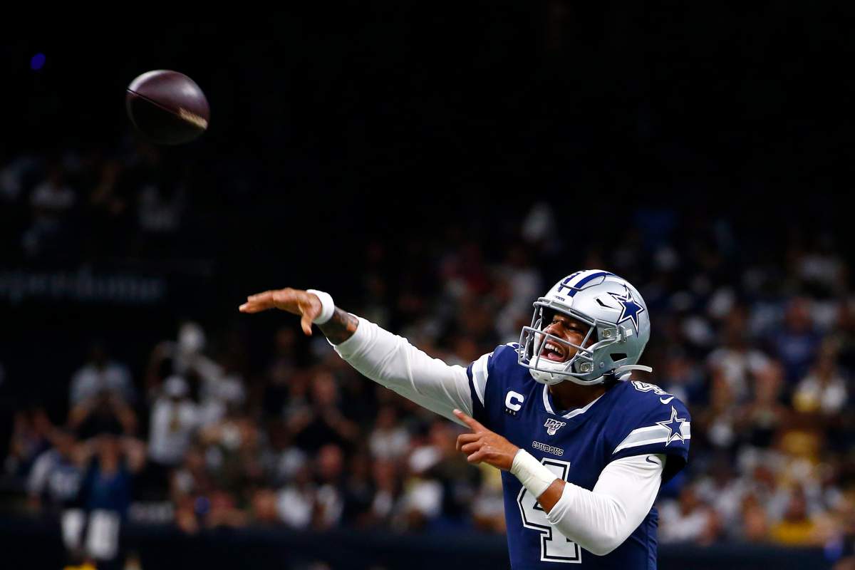 Dallas Cowboys quarterback Dak Prescott (4) throws a pass in the first half of an NFL football game against the New Orleans Saints in New Orleans, Sunday, Sept. 29, 2019.