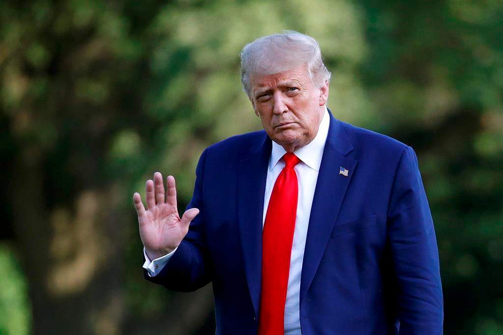 President Donald Trump walks on the South Lawn of the White House in Washington, Wednesday, July 15, 2020, after stepping off Marine One.